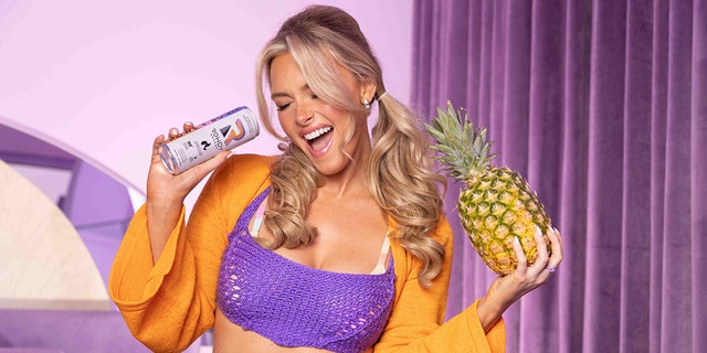 Camille Kostek partnered with Rowdy energy drink.