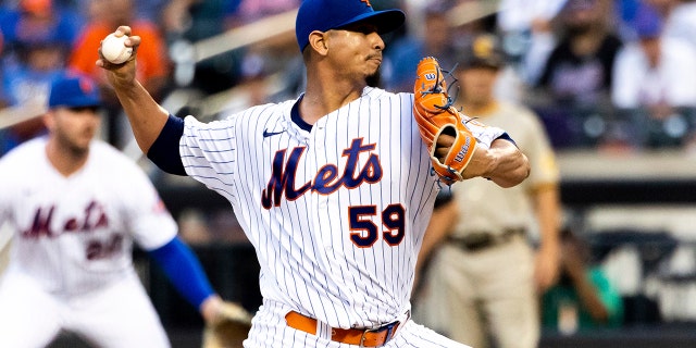 New York Mets starting pitcher Carlos Carrasco throws during the second inning of a baseball game against the San Diego Padres, Sunday, July 24, 2022, in New York.