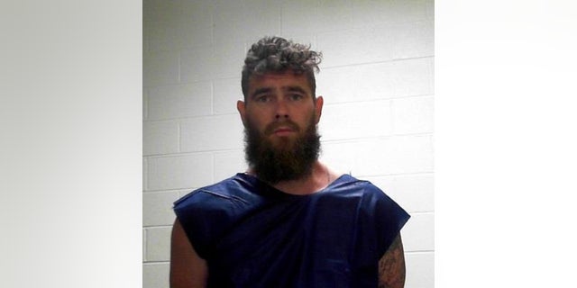 Chad Jennings is facing charges including first-degree murder after officials found the burned remains of a toddler (Image via Oklahoma State Bureau of Investigation)