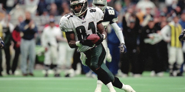 Eagles' Charles Johnson runs against the Dallas Cowboys at Veterans Stadium in Philadelphia on October 10, 1999.