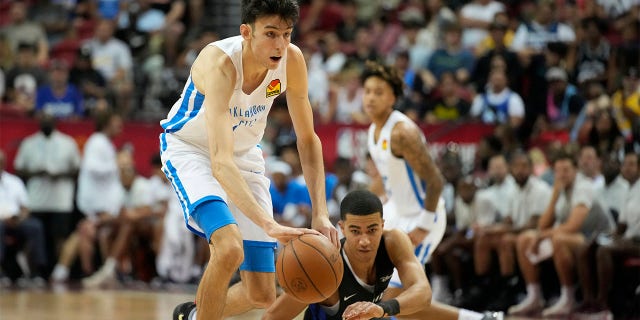 Oklahoma City Thunder's Chet Holmgren drives up the court against the Orlando Magic during the first half an NBA summer league basketball game Monday, July 11, 2022, in Las Vegas.