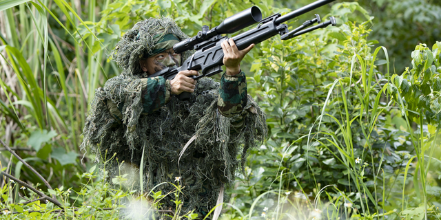 Chinese special forces soldiers train in laibin City, Guangxi Province, China, on June 16.