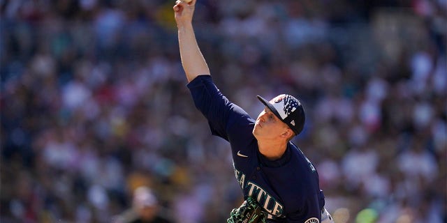 Seattle Mariners starting pitcher Chris Flexen works against a San Diego Padres batter during the third inning of a baseball game Monday, July 4, 2022, in San Diego.