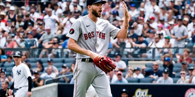 Boston Red Sox starting pitcher Chris Sale walks off the mound after a hand injury during the second inning of a baseball game against the New York Yankees, Sunday, July 17, 2022, in New York.