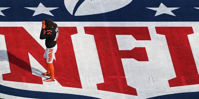 Cincinnati Bengals long snapper Clark Harris stands on the NFL logo during warmups for the Super Bowl between the Cincinnati Bengals and the Los Angeles Rams on February 13, 2022 at SoFi Stadium in Inglewood, California.