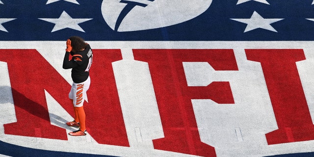 Cincinnati Bengals long snapper Clark Harris hovers above the NFL logo during the Super Bowl warmup between the Cincinnati Bengals and the Los Angeles Rams at SoFi Stadium in Inglewood, Calif., February 13, 2022. standing in
