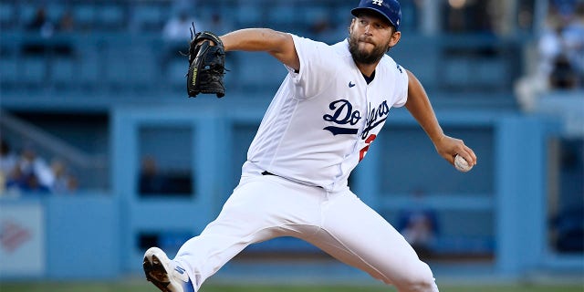Starting pitcher Clayton Kershaw of the Los Angeles Dodgers throws against the Chicago Cubs during the first inning at Dodger Stadium July 9, 2022, in Los Angeles.