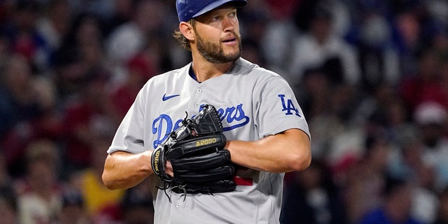 Los Angeles Dodgers starting pitcher Clayton Kershaw looks toward the outfield after giving up a double to the Los Angeles Angels' Luis Rengifo during the eighth inning of a game Friday, July 15, 2022, in Anaheim, Calif.