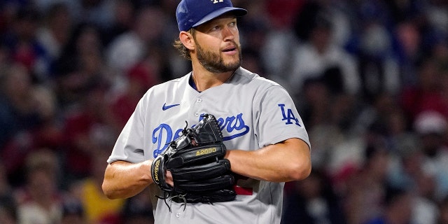 Los Angeles Dodgers pitcher Clayton Kershaw looks toward the outfield after giving up a double to the Los Angeles Angels' Luis Rengifo during the eighth inning of a game July 15, 2022, in Anaheim, Calif.