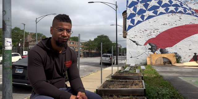 Assistant pastor TJ Groom sits outside of New Beginnings Church in the South Side of Chicago. (Fox News Digital/Lisa Bennatan)