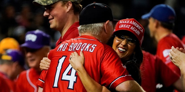 Republicans, including U.S. Representatives Mo Brooks (R-AL) and Lauren Boebert (R-CO), celebrate their 13-12 win over the Democrats at the end of the annual Congressional Baseball game at Nationals Park in Washington, U.S., Sept. 29, 2021. 