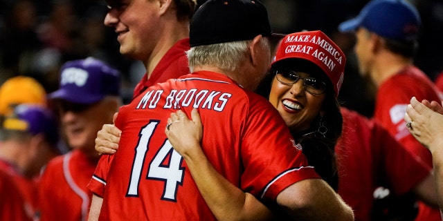 Republicans, including U.S. Representatives Mo Brooks (R-AL) and Lauren Boebert (R-CO), celebrate their 13-12 win over the Democrats at the end of the annual Congressional Baseball game at Nationals Park in Washington, U.S., Sept. 29, 2021.