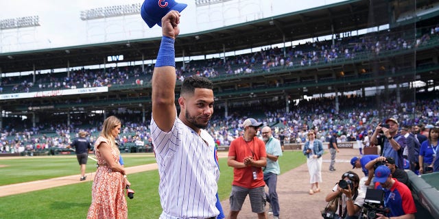 Willson Contreras of the Cubs waves as he heads to the clubhouse following his team's win over the Pittsburgh Pirates at Wrigley Field on July 26, 2022, in Chicago.