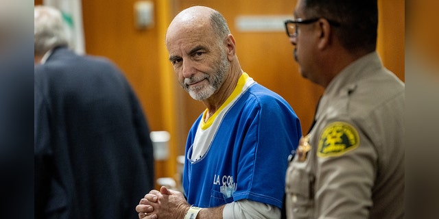 Van Nuys, CA - July 25: Jeffrey Cooper, Hollywood architect and film academy member, enters the courtroom before he was sentenced to eight years in state prison for child molestation, after being found guilty by a jury in May of three counts of child molestation, at the Van Nuys Courthouse in Van Nuys, CA, Monday, July 25, 2022. 