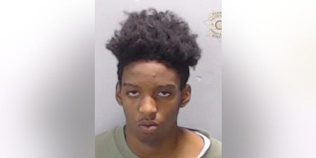 A mugshot of Courtney Hall