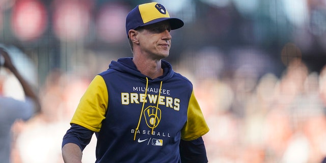 Milwaukee Brewers manager Craig Counsell walks to the dugout after making a pitching change during the eighth inning against the San Francisco Giants in San Francisco Saturday, July 16, 2022. 