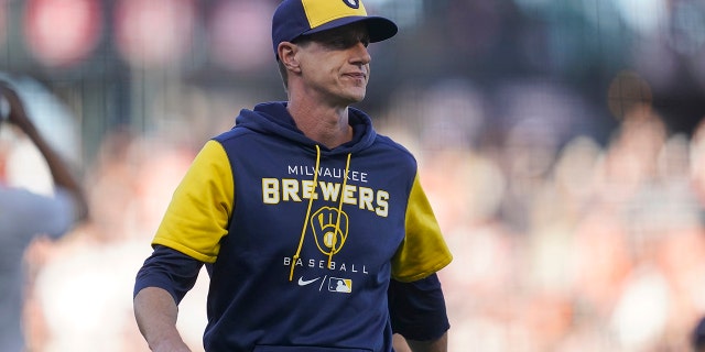 Milwaukee Brewers manager Craig Counsell walks to the dugout after making a pitching change during the eighth inning against the San Francisco Giants in San Francisco Saturday, July 16, 2022. 