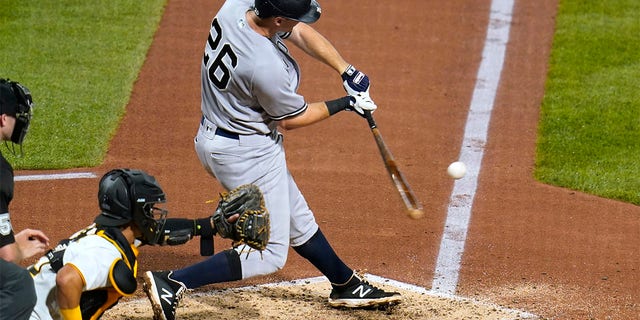 New York Yankees' DJ LeMahieu hits a two-run single off Pittsburgh Pirates starting pitcher Mitch Keller during the fifth inning of a baseball game in Pittsburgh, Wednesday, July 6, 2022. 
