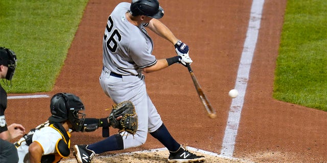 New York Yankees' DJ LeMahieu hits a two-run single off Pittsburgh Pirates starting pitcher Mitch Keller during the fifth inning of a baseball game in Pittsburgh, Wednesday, July 6, 2022.