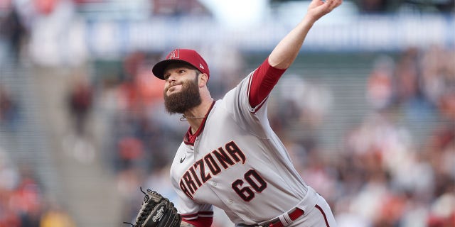 Dallas Keuchel #60 of the Arizona Diamondbacks pitches against the San Francisco Giants in the first inning at Oracle Park on July 12, 2022 in San Francisco, California.