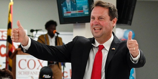 Republican gubernatorial candidate Dan Cox declares victory over his opponents at his campaign party on primary election night at Vigilant Hose Company Event Hall in Emmitsburg, Md., on Tuesday, July 19, 2022.  (Kenneth Lam/The Baltimore Sun via AP)