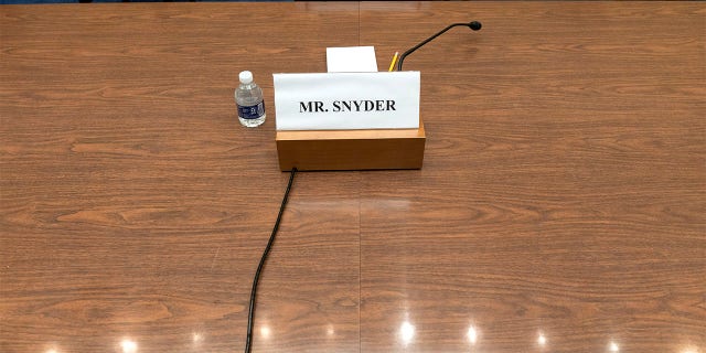 A placard for Washington Commanders' Dan Snyder is seen during a House Oversight Committee hearing on the Commanders' workplace conduct, on Capitol Hill in Washington, Wednesday, June 22, 2022. Snyder is set to testify later Thursday morning, July 28, before a congressional committee that is investigating the NFL team’s history of workplace misconduct.