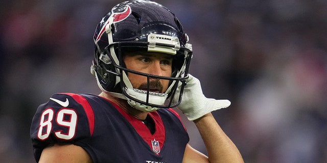 Danny Amendola, #89 of the Houston Texans, adjusts his helmet against the Tennessee Titans during an NFL game at NRG Stadium on January 09, 2022 in Houston, Texas.