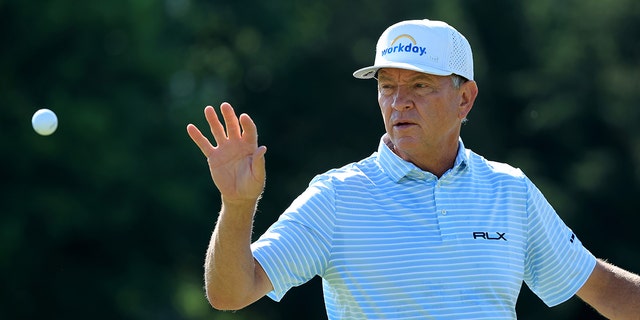 Davis Love III catches a ball during the first round of the Bridgestone Senior Players Championship at Firestone Country Club on July 7, 2022, in Akron, Ohio.