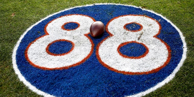 Detail view of a ball at the #88 Tribute logo to the late former Denver Broncos player Demerius Thomas after a game against the Detroit Lions at Empower Field at Mile High on December 12, 2021 in Denver, Colorado. 