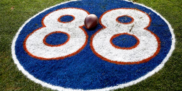 A detailed view of a ball on the #88 tribute logo to the late former Denver Broncos player Demaryius Thomas after the game against the Detroit Lions at Empower Field At Mile High on December 12, 2021 in Denver, Colorado.