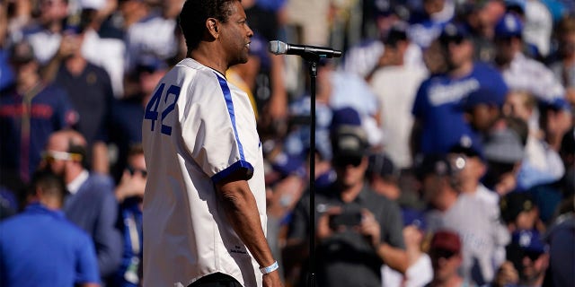 Actor Denzel Washington speaks during a tribute to Jackie Robinson prior top the MLB All-Star baseball game between the National League and National League, Tuesday, July 19, 2022, in Los Angeles.