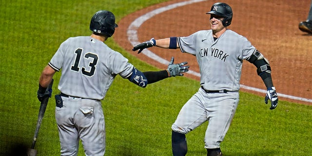New York Yankees' Josh Donaldson, right, celebrates with Joey Gallo after hitting a solo home run off Pittsburgh Pirates starting pitcher Mitch Keller during the sixth inning of a baseball game in Pittsburgh, Wednesday, July 6, 2022. 