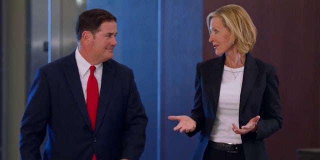 Arizona Gov. Doug Ducey endorses Karrin Taylor Robson in the state's GOP gubernatorial primary. Ducey and Taylor Robson are seen in a campaign video released on July 7, 2022