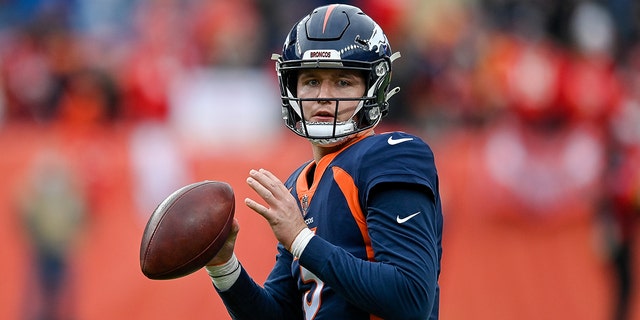 Drew Lock of the Broncos warms up before facing the Kansas City Chiefs at Empower Field At Mile High on Jan. 8, 2022, in Denver, Colorado.