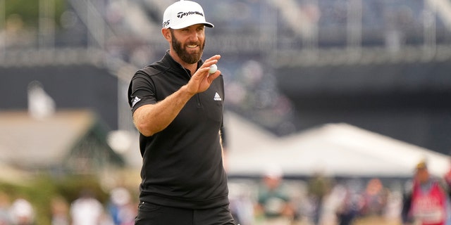 Dustin Johnson of the U.S. after playing a birdie on the 16th hole during the second round of the British Open on the Old Course at St. Andrews, Scotland, Friday, July 15, 2022.