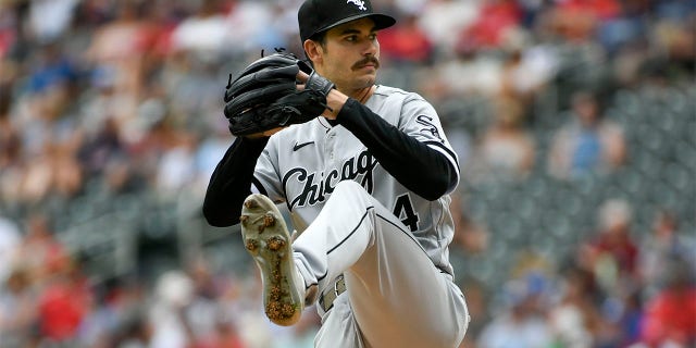 Chicago White Sox pitcher Dylan Cease throws against the Minnesota Twins during the first inning of a baseball game, Sunday, July 17, 2022, in Minneapolis.