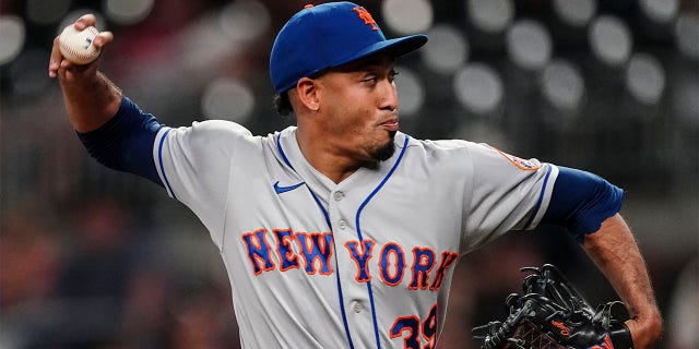 New York Mets relief pitcher Edwin Diaz works the ninth inning of a baseball game against the Atlanta Braves, Monday, July 11, 2022, in Atlanta.