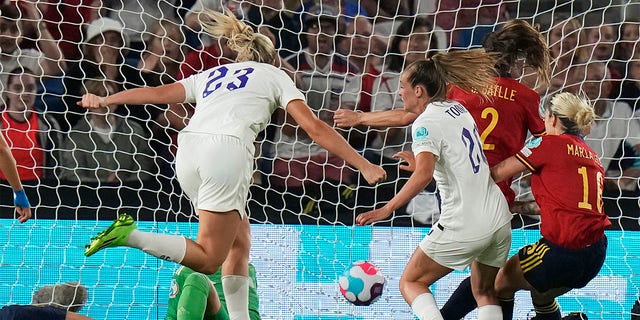 England's Ella Toone, centre right, celebrates after scoring her side's first goal during the Women Euro 2022 quarter final soccer match between England and Spain at the Falmer stadium in Brighton, Wednesday, July 20, 2022. 