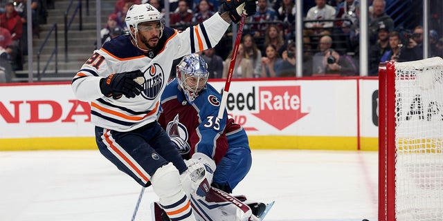 Evander Kane #91 of the Edmonton Oilers celebrates after scoring a goal on Darcy Kumper #35 of the Colorado Avalanche during the first period in Game One of the Western Conference Finals of the 2022 Stanley Cup Playoffs at Ball Arena on May 31, 2022.  Denver, Colorado. 