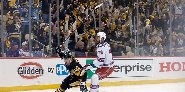 Evgeni Malkin #71 of the Pittsburgh Penguins reacts after scoring a goal during the second period in Game Six of the First Round of the 2022 Stanley Cup Playoffs against the New York Rangers at PPG PAINTS Arena on May 13, 2022 in Pittsburgh, Pennsylvania. 