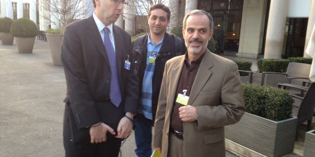 LAUSANNE, SWITZERLAND- MARCH 18: Alan Eyre, left, the Persian language spokesman for the US State Department speaks with Iranian reporters during the Iran nuclear talks in Lausanne, Switzerland, March 18, 2015.