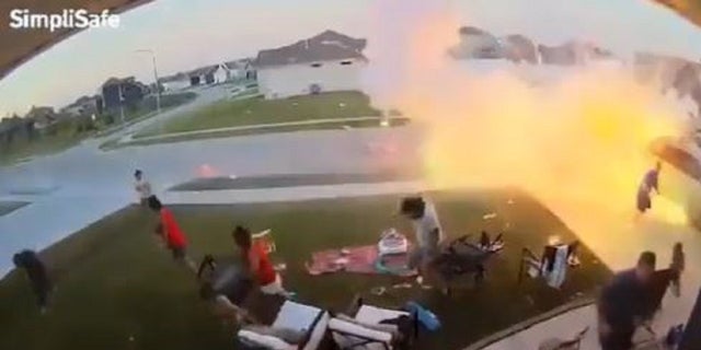 A fireworks explosion during a July Fourth celebration caused a giant fire and prompted adults and children to flee a front lawn. 