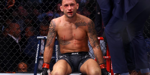 Frankie Edgar reacts after losing to Marlon Vera in his bantamweight bout during the UFC 268 event at Madison Square Garden on November 6, 2021 in New York City. 