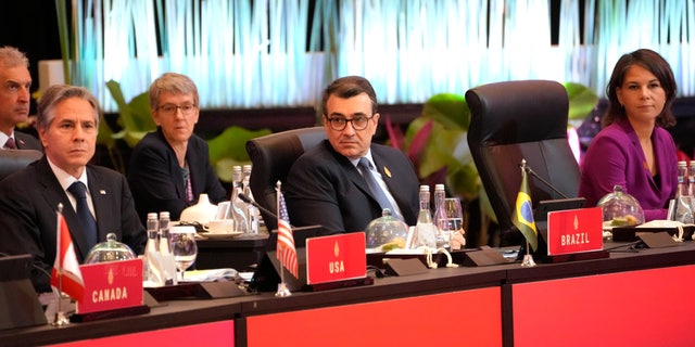 From left to right, U.S. State Secretary Antony Blinken, Brazilian Foreign Minister Carlos Franca, attend the opening session of the G-20 Foreign Ministers' Meeting in Nusa Dua, Bali, Indonesia, Friday, July 8, 2022. (G3 Box News Photo/Dita Alangkara, Pool)