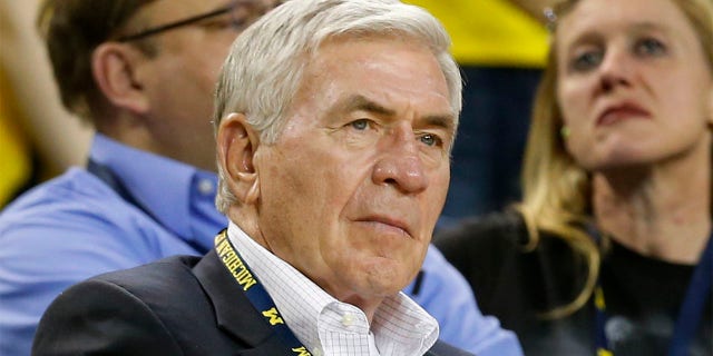 Former Michigan football coach Gary Moeller watches the second half of an NCAA college basketball exhibition game against Wayne State in Ann Arbor, Michigan, in November. February 4, 2013 Former Michigan, Illinois and Detroit Lions coach Moeller passed away on Monday, July 11, 2022. He was 81 years old. The University of Michigan announced his death, no cause given.