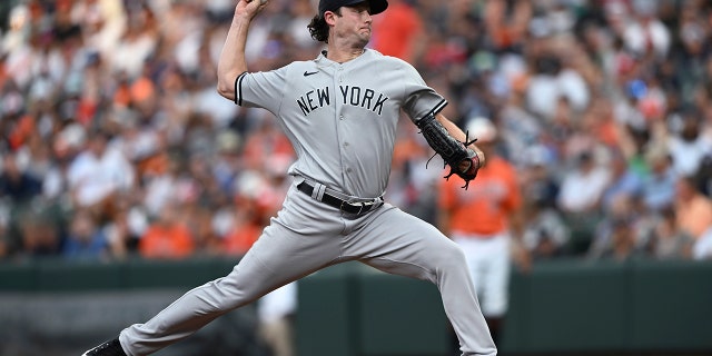 New York Yankees pitcher Gerrit Cole delivers to a Baltimore Orioles batter during the first inning Saturday, July 23, 2022, in Baltimore.