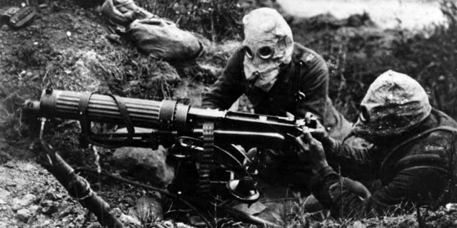A photo of gas-masked men of the British Machine Gun Corps with a Vickers machine gun during the first battle of the Somme in 1916. Garrett Morgan earned a patent for his gas mask invention in 1914 and shared the technology with Allied armies.