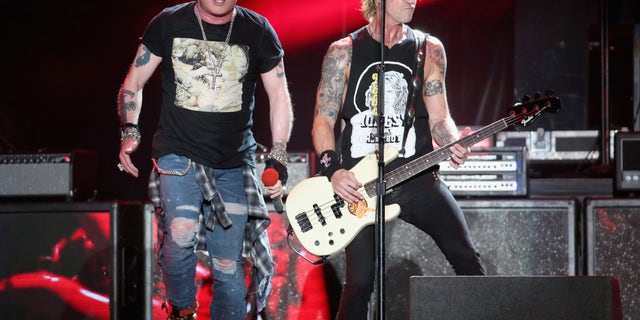 Although they were forced to cancel this show, they assured their fans they are working towards rescheduling, and encouraged them not to get rid of their tickets just yet. Axl Rose and Duff McKagan of Guns N' Roses are pictured here in 2019. 