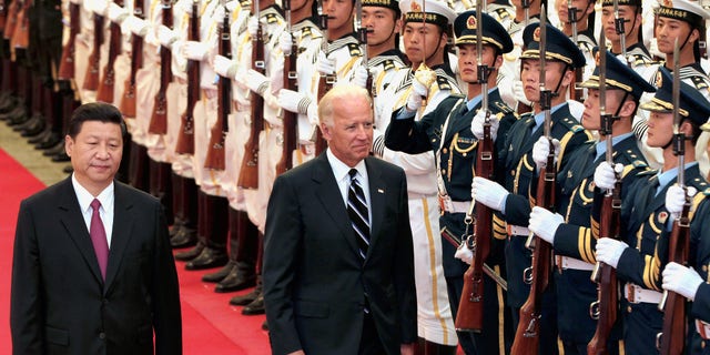 Joe Biden, then vice president, and Chinese President Xi Jinping. (Photo by Lintao Zhang/Getty Images)