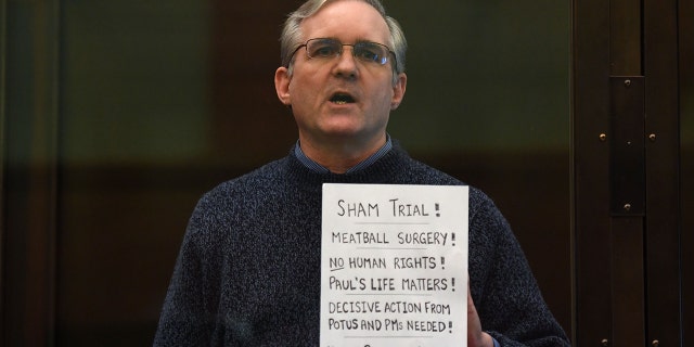 Paul Whelan, a former U.S. Marine accused of espionage and arrested in Russia in December 2018, stands in the defendant's cage as he awaits sentencing on June 15, 2020. 